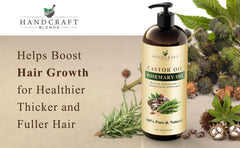 Castor oil with rosemary on wooden surface