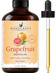 Grapefruit essential oil in amber glass bottle with dropper