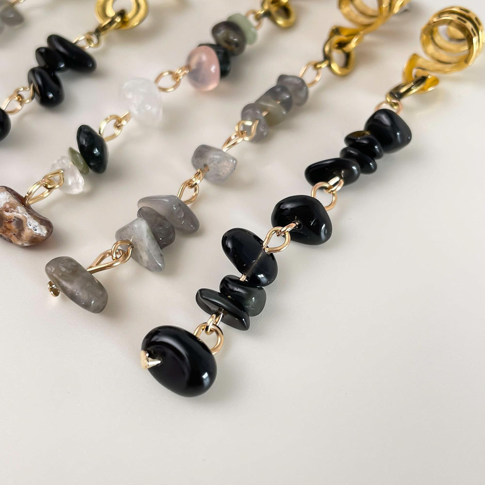 HausHr retro-inspired metalwork detail adds vintage charm to the set.