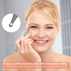 Gua sha tool used on facial area for massage