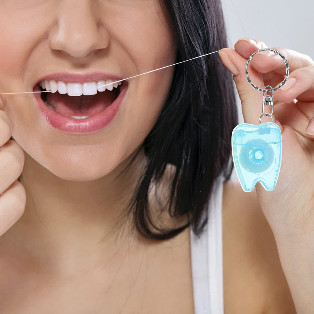 Travel-friendly floss box attached to keychain