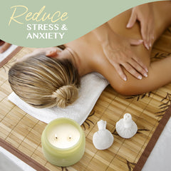 Healing candle with lid placed on a wooden surface.