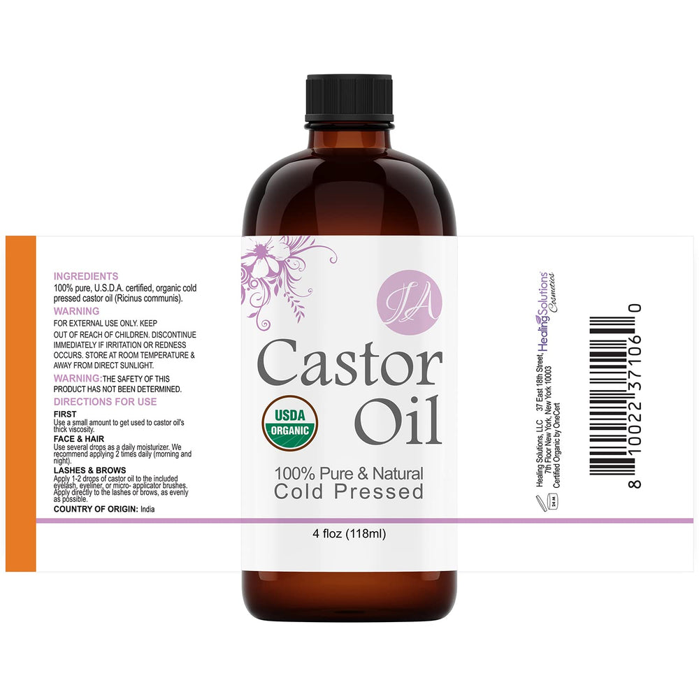 Healing Solutions Castor Oil dropper close-up ready for use.