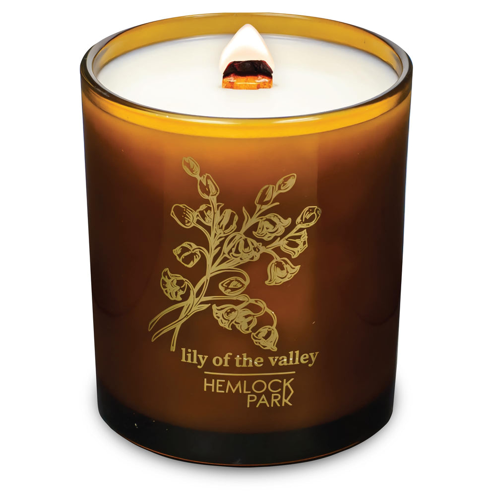 Hemlock Park Amber & Gold Wood Wick Candle, 14 oz coconut wax, Lily of the Valley scent, handcrafted in America.