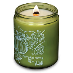 Close-up of natural coconut wax candle with a wooden wick