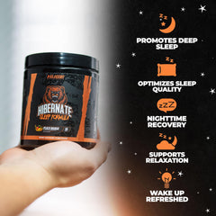 Scoop with Hibernate Sleep Supplement powder showing Peach Mango flavor