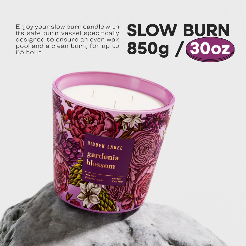 Hidden Label three-wick candle closeup emphasizes strong fragrance throw for open rooms.