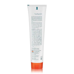 Mint flavored toothpaste foam on brush