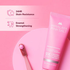 Toothbrush applying Himalaya PINKSALT toothpaste