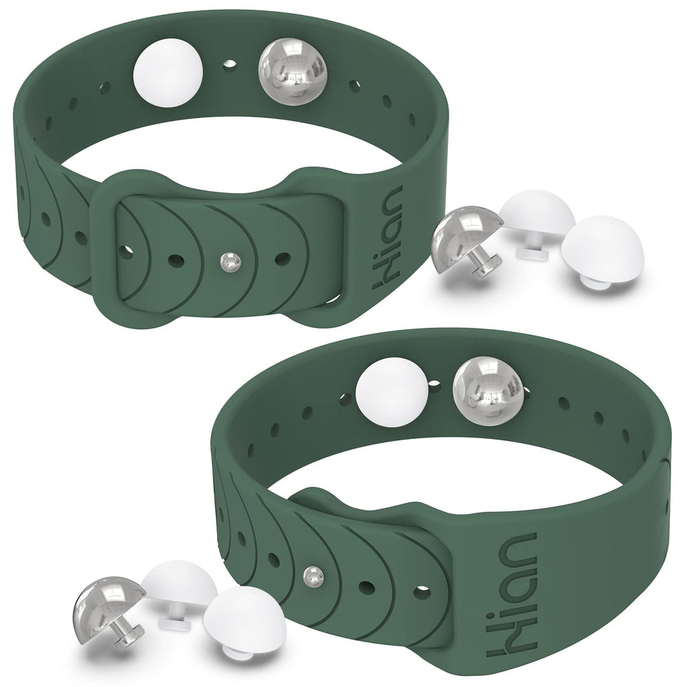 Hion motion sickness bands worn on the wrist in pine green may ease travel nausea