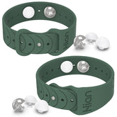 Hion motion sickness bands worn on the wrist in pine green may ease travel nausea