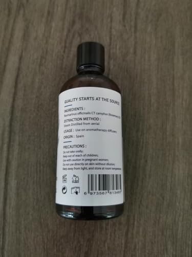 Close-up of HIQILI rosemary essential oil bottle for diffuser