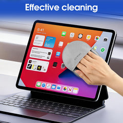Cloth being used to clean laptop, tablet and TV screens.