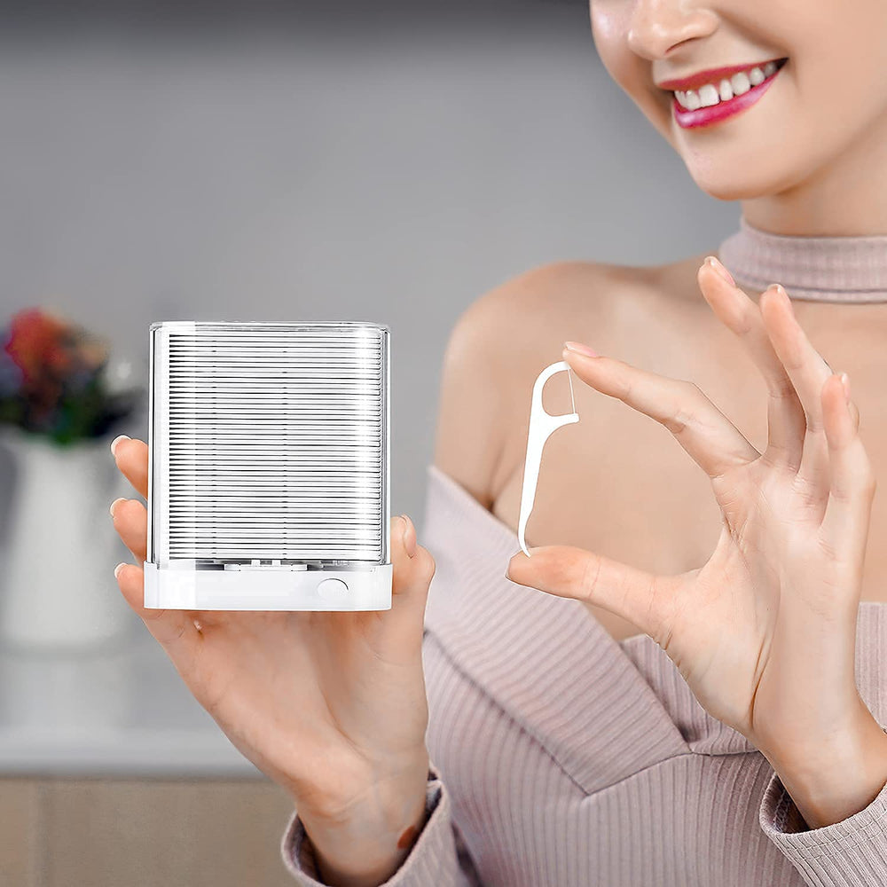 Dispenser open bottom refill access for floss refills