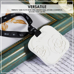 HOME ARCHIVE ceramic diffuser with bird design enhances desks or shelves with scent.