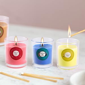 Home fragrance scented candles in decorative glass jars