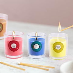Home fragrance scented candles in decorative glass jars