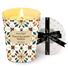 HomeLights Peach Blossom Freesia 6.7oz candle in a clear jar - front view
