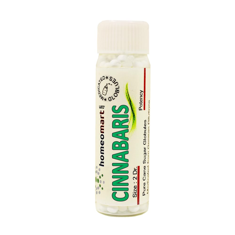 Close-up of homeopathy pellets in a glass vial (Cinnabaris 1M, pack of 3)