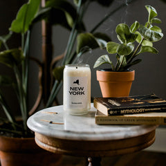 Top notes of apple, nutmeg and clove in Homesick New York candle