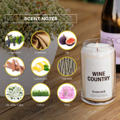 Homesick Wine Country candle burning in glass jar