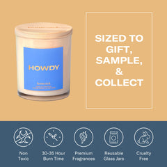 Homesick Howdy 7.5oz candle packaging and jar on a wooden surface