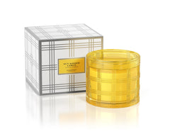HomeWorx Sun Kissed Lemon candle in colored glass, ideal for gifting and ambience
