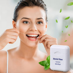 Mint flavor dental floss in use with fresh breath