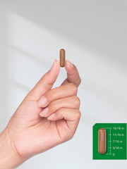 Lifestyle image of Horbäach Chaga Mushroom Capsules with bottle on desk