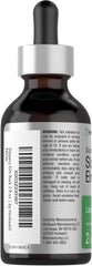 Pouring Horbaach Slippery Elm Liquid Drops into a spoon