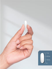 Lifestyle image of Horbäach Water Pills with glass of water