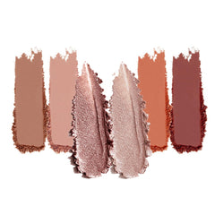 Houksouml palette swatches on arm show high-pigment payoff.