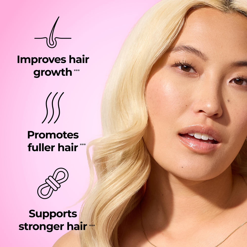 Close-up of HUM Hair Growth Gummies strawberry flavor