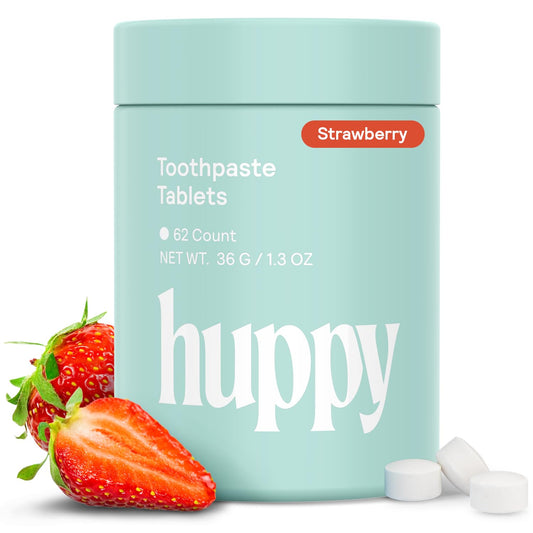 Front view of HUPPY toothpaste tablets in travel tin