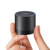 Hushing portable mini white noise machine front view emphasizes compact travel-friendly design for sleep.