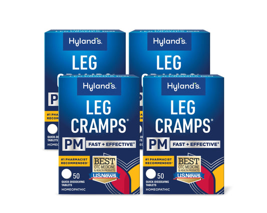Hyland's Leg Cramps PM tablets dissolving under the tongue for fast relief.