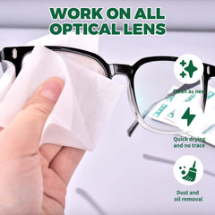 Close-up of wiping eyeglasses with Icepac