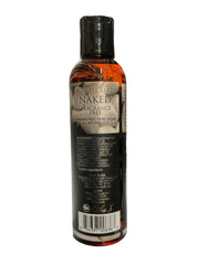 Close-up of the Naked Massage Oil label on the bottle
