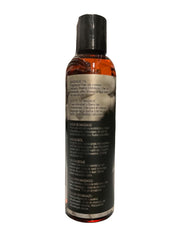 4 oz bottle with massage oil texture on a neutral background