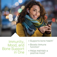 Close-up of bottle label highlighting bone health nutrients