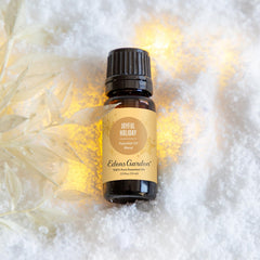 Close-up of Joyful Holiday essential oil bottle label