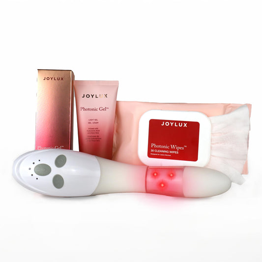 Joylux vFit device in use for at-home pelvic floor session.