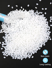 Thermoplastic beads in water for tooth repair