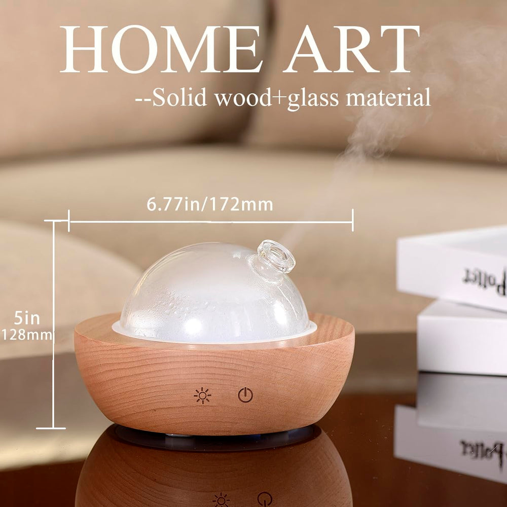 Close-up of the wood base and hand-blown glass cover of the Kakoda diffuser.