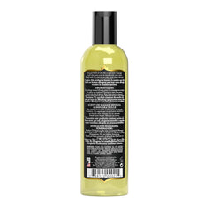 Warm, sensual massage oil setup featuring KAMA SUTRA Aromatics Sweet Almond 8oz