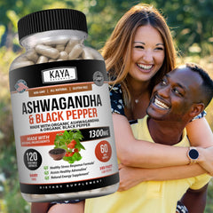 Ashwagandha capsules being held for size reference