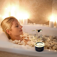 Woman gifting a rotating Rose candle