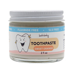 BALM! Baby kids fluoride-free toothpaste in orange flavor in a glass jar