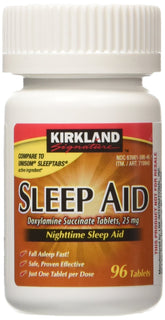 Kirkland Signature Sleep Aid tablet closeup showing 25 mg doxylamine for nighttime rest