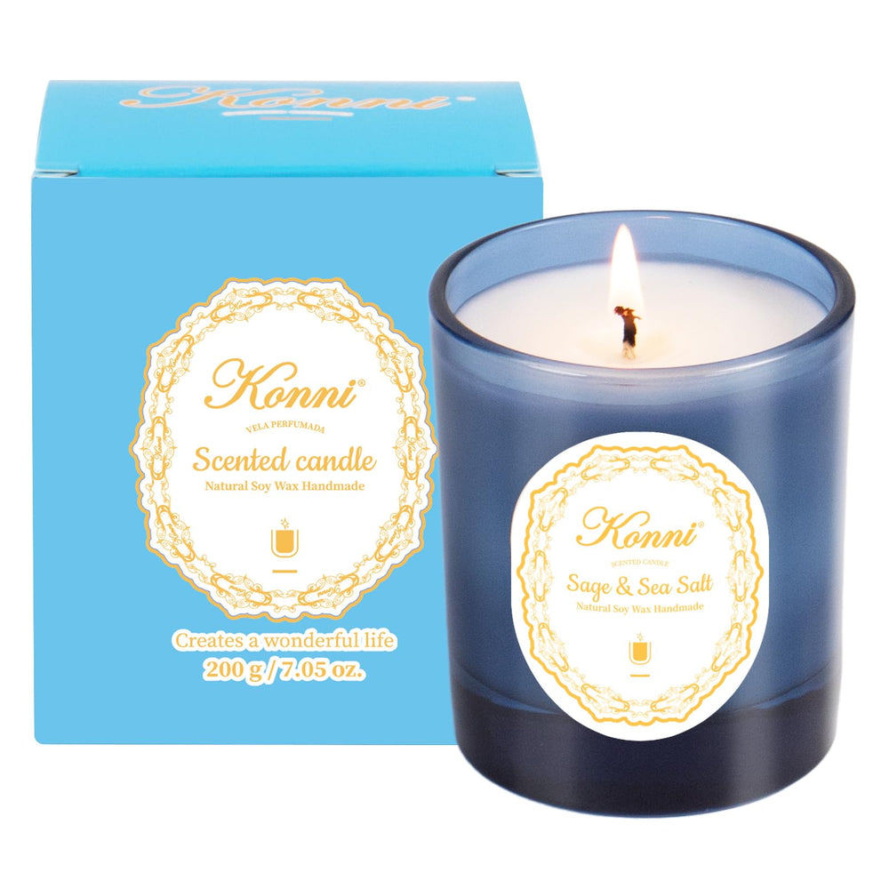Aromatherapy candle burning in a cozy room with Sage Sea Salt scent